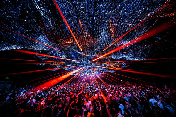 Hard techno festival crowd with red lasers and dramatic stage production at Time Warp — Best Hard Techno Festivals in Europe 2026