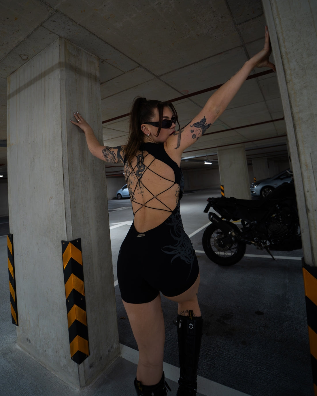 BLACK FERAL SIGILISM ONE-PIECE ROMPER