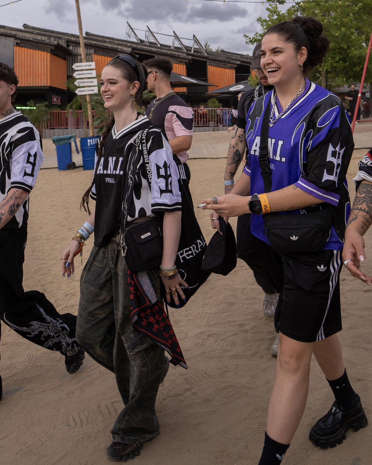 A.N.I. (wears L) in the Purple and Andie (wears M) in the Monochrome, walking at Nibirii Festival