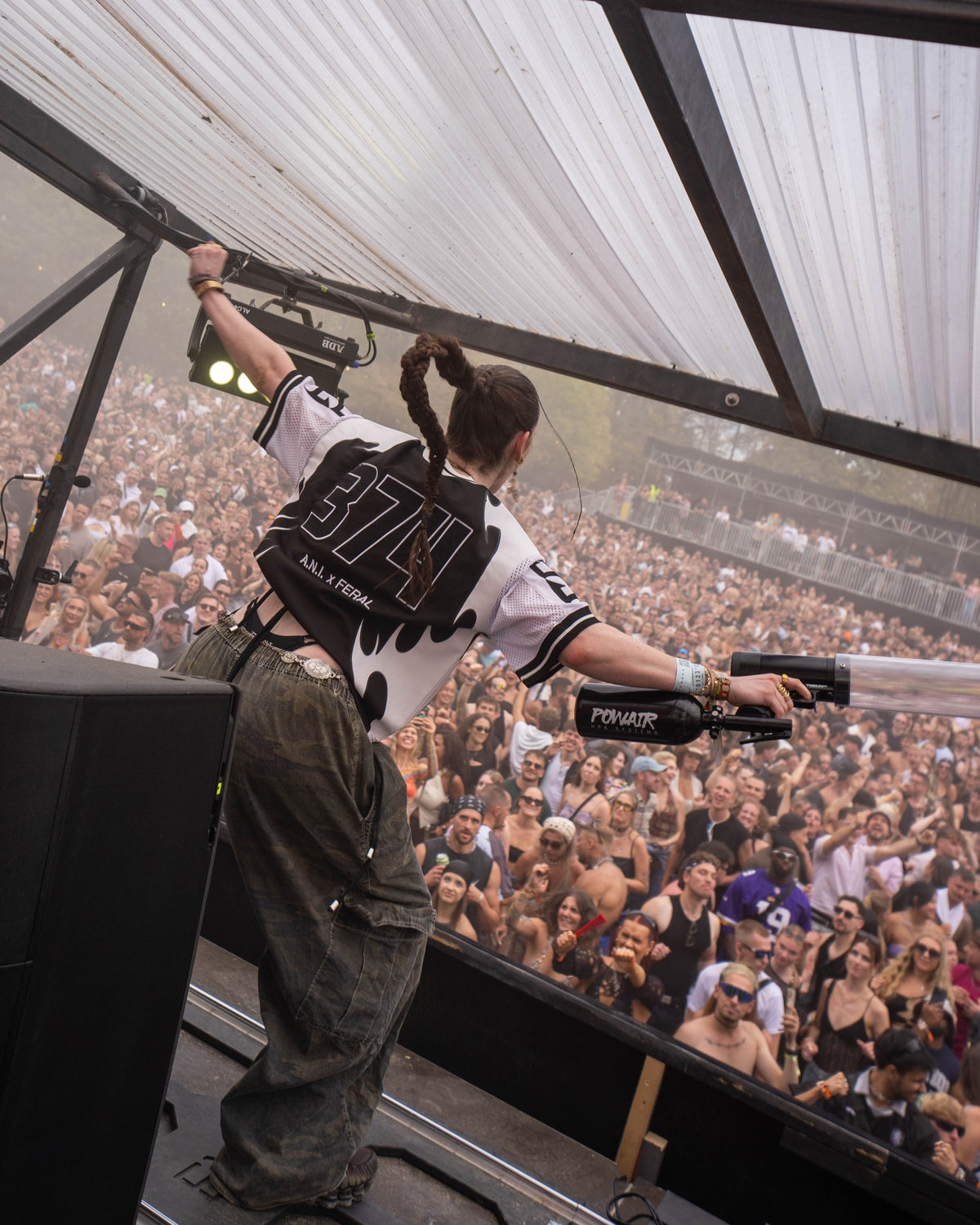 Andie (wears M) on stage in the A.N.I. x FERAL Jersey Monochrome, back with 374