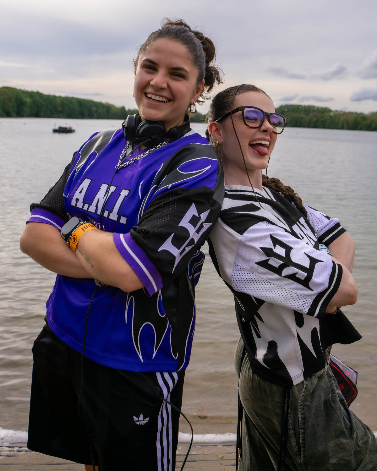 A.N.I. (wears L) in the A.N.I. x FERAL Jersey Purple, front, with Andie in the Monochrome