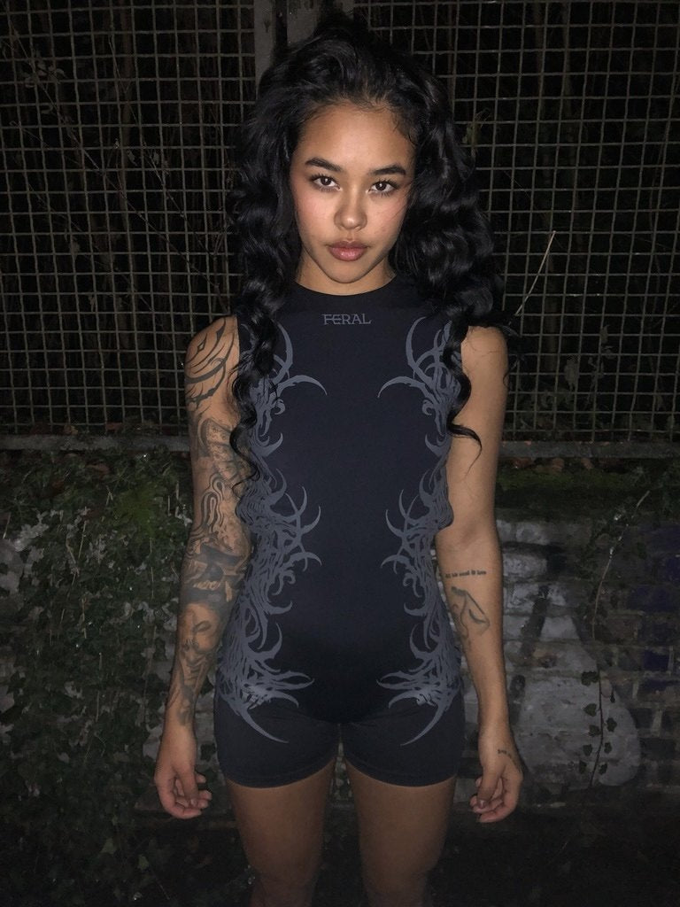 BLACK FERAL SIGILISM ONE-PIECE ROMPER
