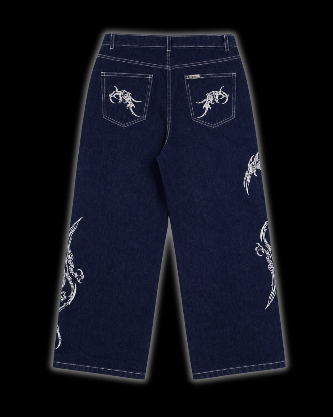 FERAL Sigilmarked Jeans back - blue denim with white cyber sigilism embroidery and FERAL back pocket tab