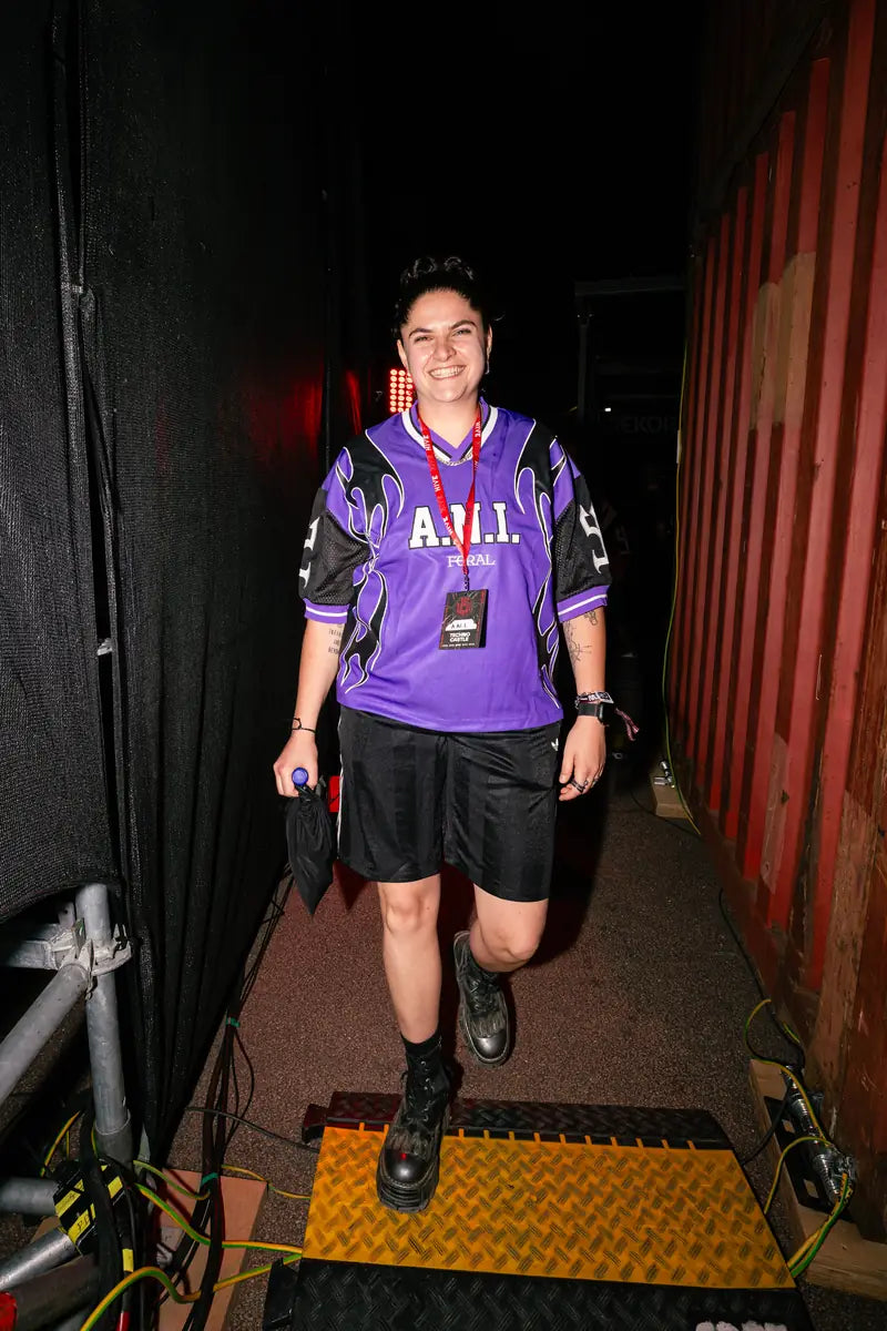 Backstage in the purple A.N.I. jersey