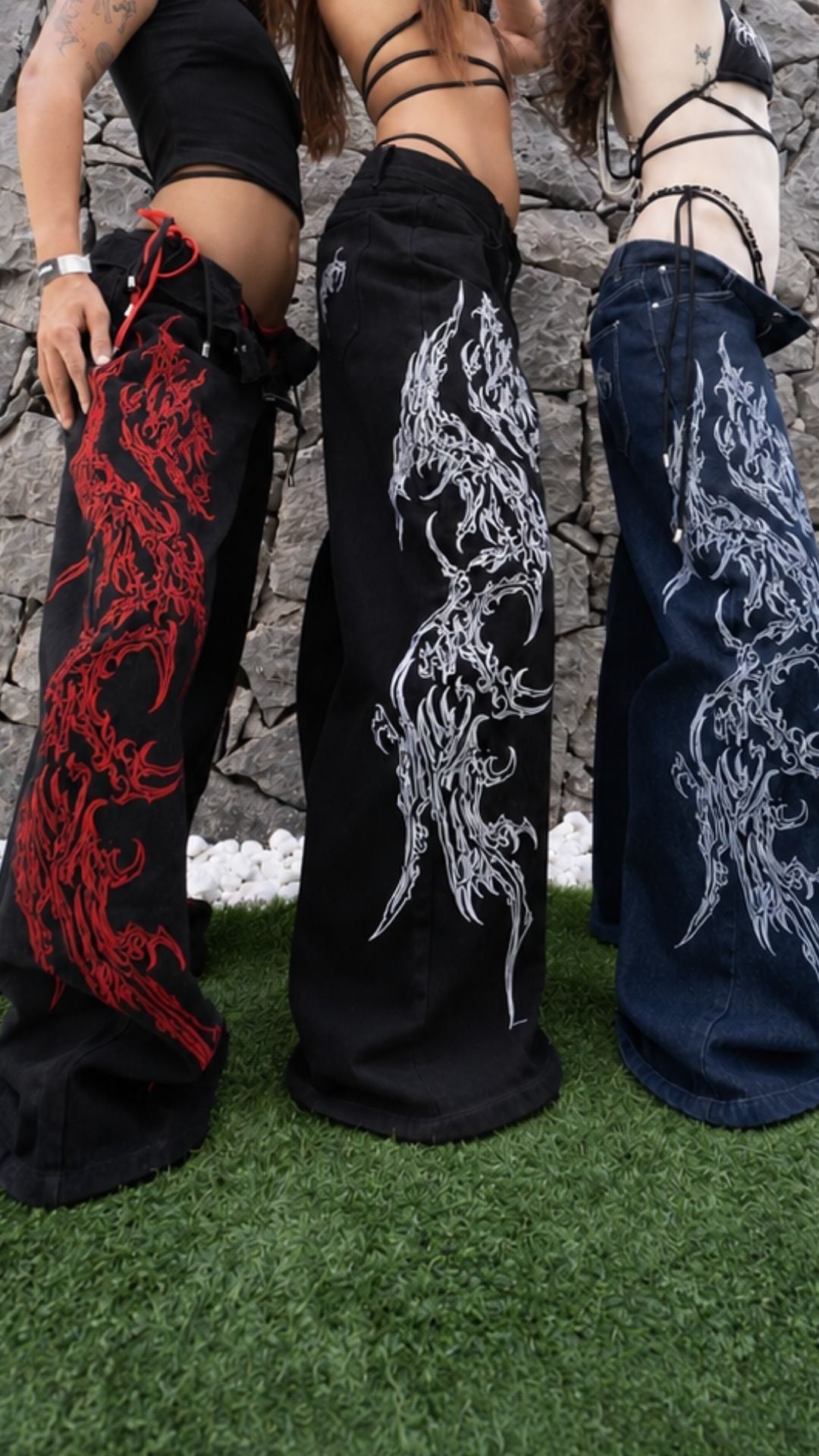 SIGILMARKED JEANS from behind in all three colourways: red, monochrome and denim blue